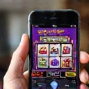 Mobile phone with slot game on screen